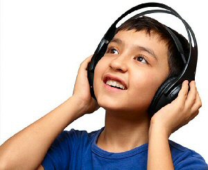 photo of boy wearing headphones, image 2